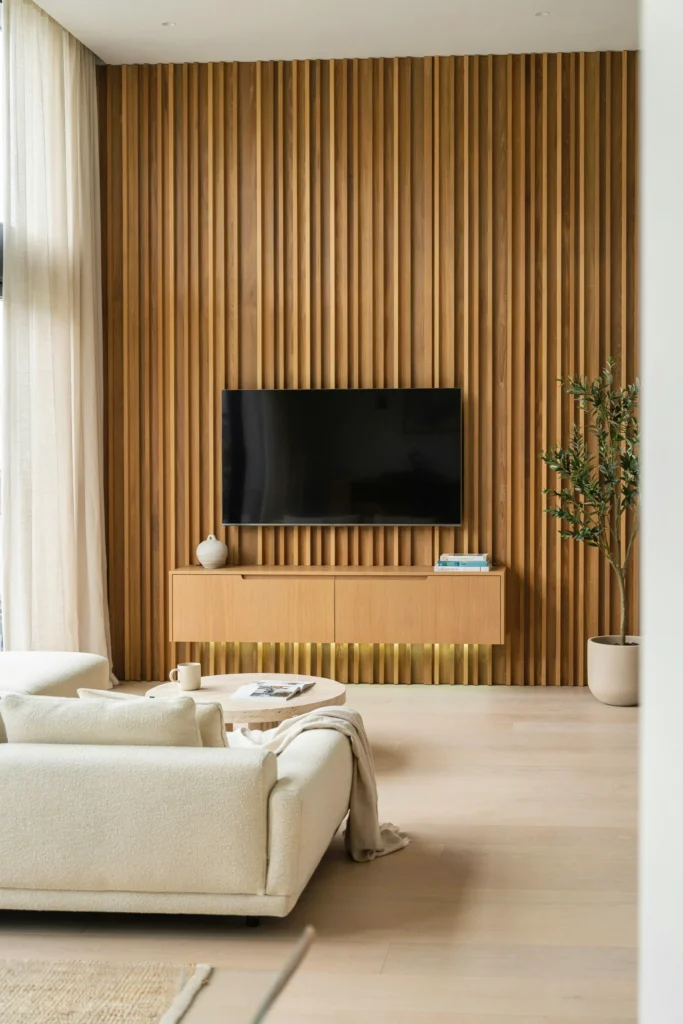 Floor-to-Ceiling Wood Slat Media Wall