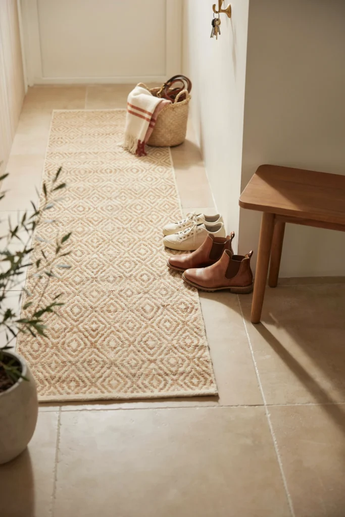 Use a Durable Runner Rug for Warmth and Sound