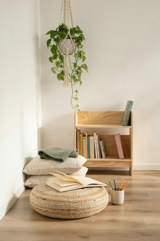 Scandinavian Corner with a Pine Bookstand and Hanging Plant