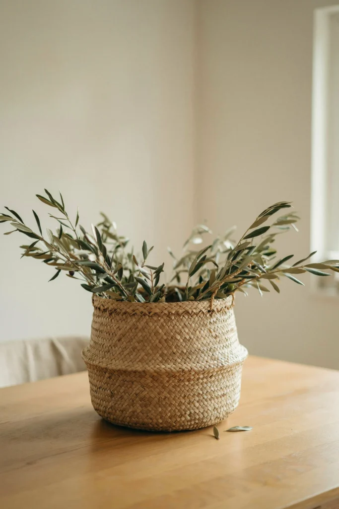 A Woven Basket Filled with Greenery