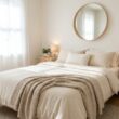 Cozy small bedroom ideas with linen bedding and wooden nightstands