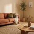 Cozy earthy living room ideas with terracotta sofa and jute rug